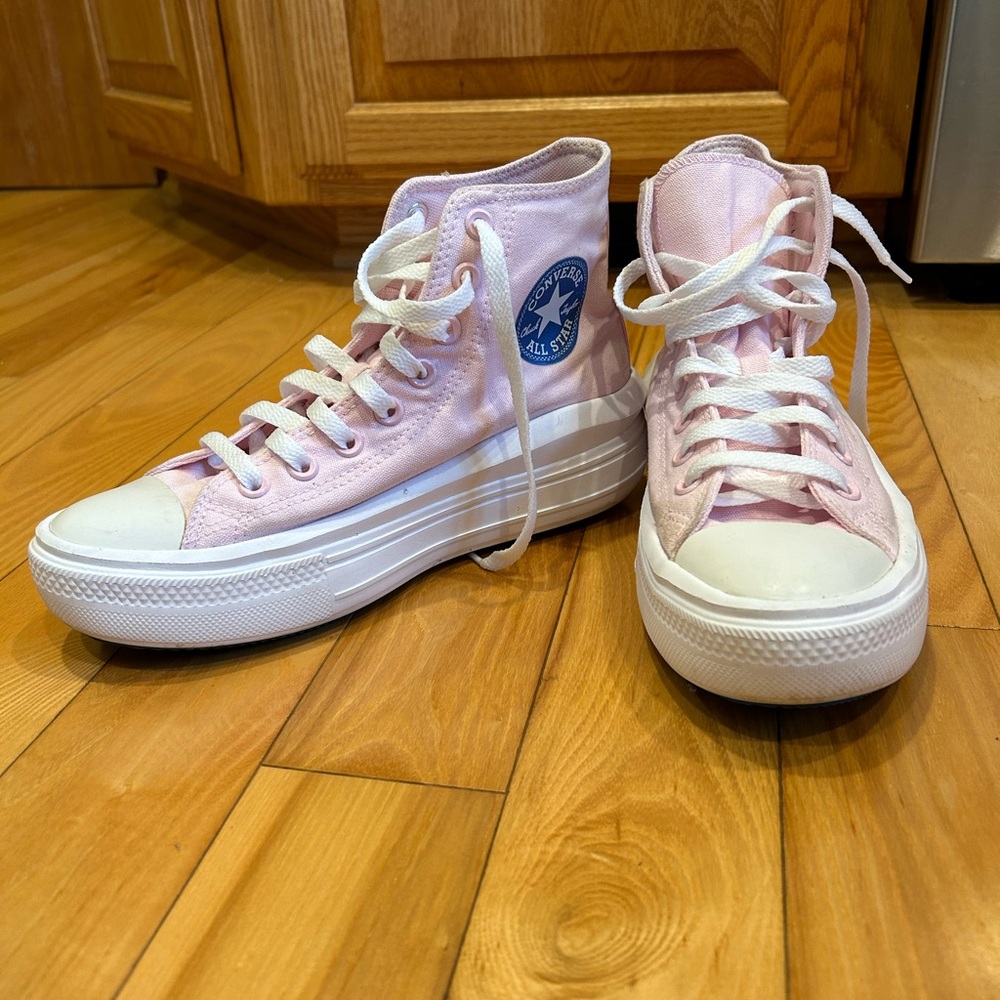 Pink high top converse with blue details!